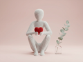 White abstract sculpture holding a red heart with a minimalistic background