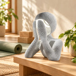 Marble NObody Lamp in a sunlit room beside a green yoga mat