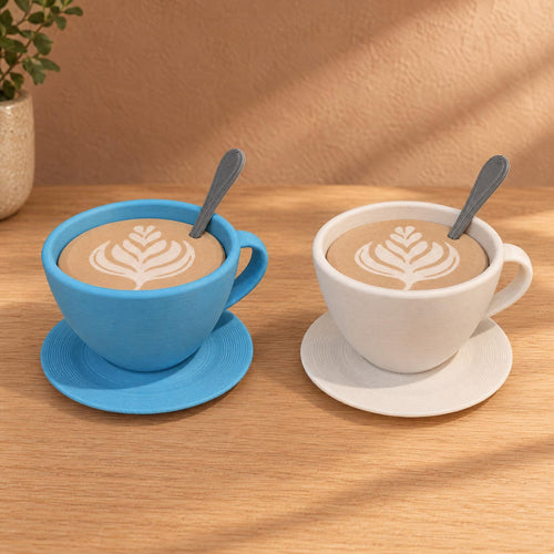 Blue and white cup-shaped storage containers with latte-art lids, spoons and saucers