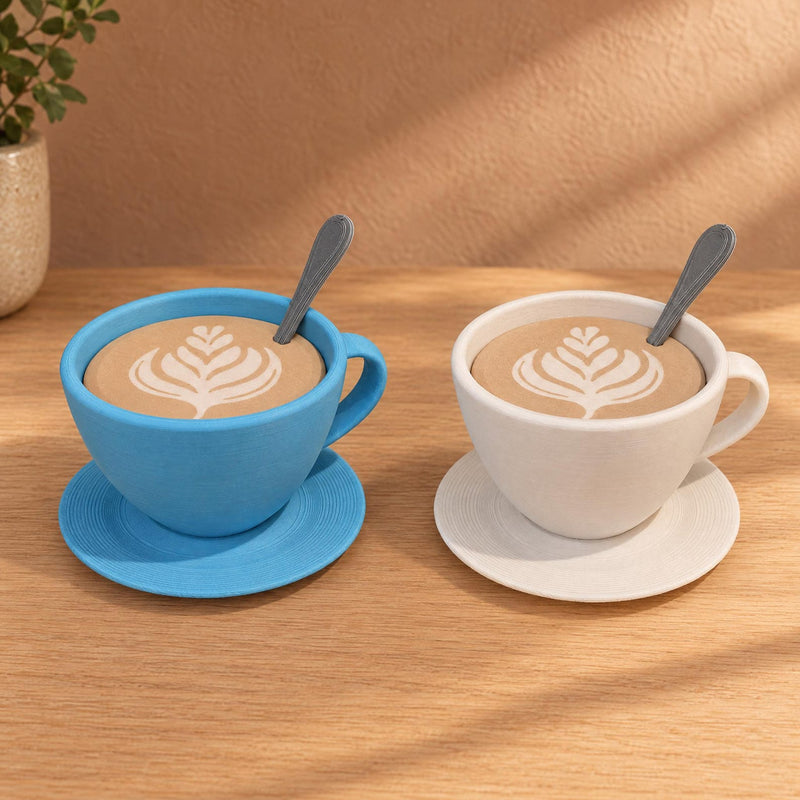 Blue and white cup-shaped storage containers with latte-art lids, spoons and saucers