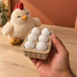 Egg basket fidget clicker with six white egg shapes