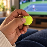 Textured neon yellow-green tennis ball clicker with white seams