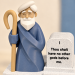 Close-up of Moses face, white beard and blue folded robe