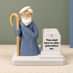 Moses Ten Commandments display against a sage background