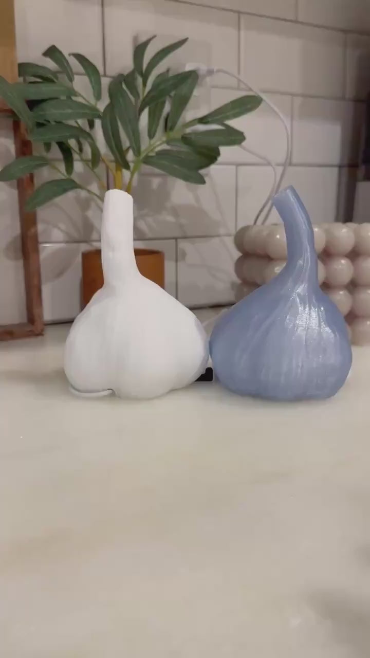 Sleepy Garlic night light colors and two-pack demonstration from Etsy