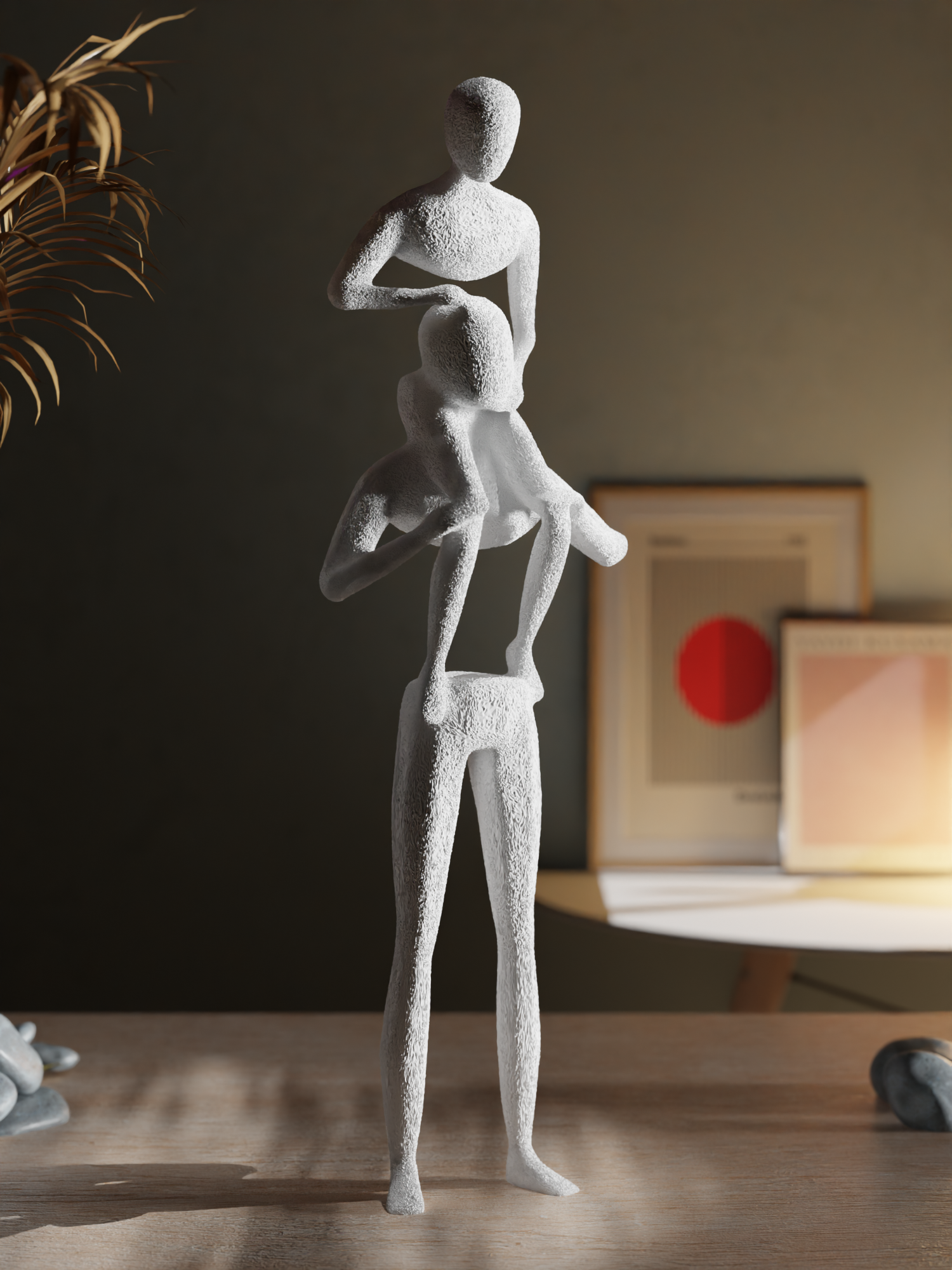 Abstract sculpture of two figures on a wooden surface with a blurred background